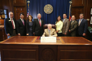 Rep. Lumsden with Gov. Deal at the HB 402 bill signing. 
