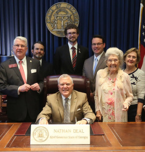 Rep. Wilkinson with Gov. Deal at the SB 168 bill signing. 