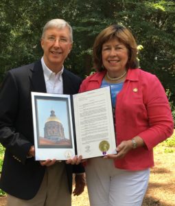 Rep. Betty Price and Medical Association of Georgia President Steve Walsh with House Resolution 396 . Dr. Price and Dr. Walsh both live in Roswell.